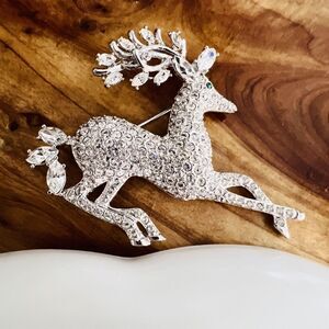 Vintage Nolan Miller Brooch Clear Rhinestone Reindeer Green Eye Pin Silver 1215